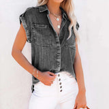 Sleeveless gray denim vest with frayed edges, featuring front pockets, modeled on a person showing the shoulder and waist area.