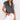 Sleeveless gray denim vest with frayed edges, featuring front pockets, modeled on a person showing the shoulder and waist area.