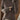 A brown 2XL women's slim fit turtleneck sweater with ribbed cuffs, highlighted in a winter fashion style. The sweater features a high collar and long sleeves, providing a cozy and chic look for the colder seasons.