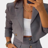 Women's slim fit gray business suit with a high-waisted design, featuring a tailored dress shirt with a collar and long sleeves, suitable for modern office wear.