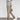 Women's slim fit olive green chinos with a high waist and tapered leg design in size XXL, displayed in a setting showcasing the trousers as the focal point.