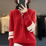 Women's red half-zip sweater, size 2XL, featuring long sleeves and a soft collar, styled as part of chic modern winter fashion.