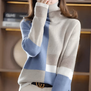 Women's striped blue turtleneck sweater featuring long sleeves and a cozy fit, showcasing winter fashion style.