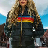 Women's black and white striped color block puffer bomber jacket, insulated for winter wear, size 3XL, shown worn by a model outdoors under a cloudy sky.