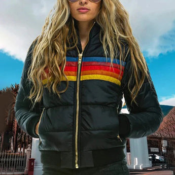 Women's black and white striped color block puffer bomber jacket, insulated for winter wear, size 3XL, shown worn by a model outdoors under a cloudy sky.