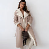 Women's tan double-breasted shearling trench coat in beige, size XL, showing the full-length design with details on the collar, waist, and long sleeves.