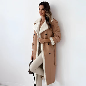 
A women's tan double-breasted shearling trench coat in khaki, size XL, featuring a wide collar, long sleeves, and reaching down to the thighs.