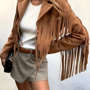 Women's tan fringed suede jacket with boho chic design, featuring long sleeves, a collared neckline, and waist-length cut, displayed against a neutral background.