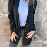 
Image of a Women's Lightweight Fall Fashion Jacket, featuring a tan suede blazer design. The blazer has long sleeves and a stylish collar, suitable for outerwear. The jacket is shown against a neutral background with focus on the textile and fashionable neck area.