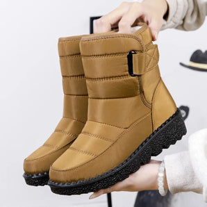 Women's tan waterproof ankle boots with insulated lining and slip-resistant soles, shown in a persimmon color, size 44.