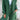 Women's green wool coat with an elegant notch collar and long sleeves, designed in a blazer style.