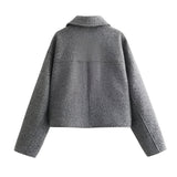 Women's grey wool cropped trucker jacket featuring a classic collar, long sleeves, and a cozy design perfect for winter outerwear.