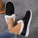 Women's turquoise fur-lined slip-on shoes featuring a stylish design, tailored for winter comfort.