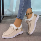 Women's turquoise fur-lined slip-on shoes with a stylish design, suitable for winter wear, shown against a neutral background.