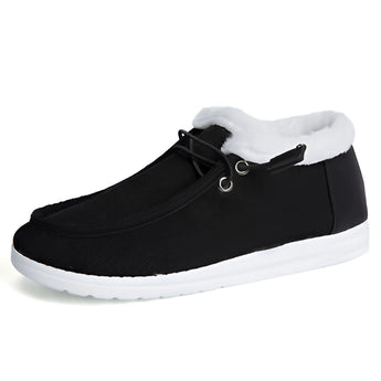 Women's turquoise fur-lined slip-on shoes in black, designed for winter, featuring a sporty and stylish look suitable for outdoor activities.