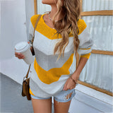 Women's oversized V-neck knit sweater in mustard yellow with striped pattern, styled in a relaxed fit; shown in size XL.