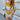 Women's oversized V-neck knit sweater in mustard yellow with striped pattern, styled in a relaxed fit; shown in size XL.