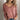Light pink-gray women's V-neck sweater with white stripes, worn by a model with long hair, paired with jeans.