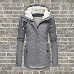 Women's grey insulated parka with a fur-lined hood, featuring long sleeves and designed for cold weather, available in size 3XL.