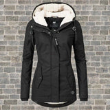 Women's waterproof grey insulated parka with fur-lined hood, black color, size 4XL, displayed in a studio setting.