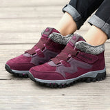 Women's waterproof insulated hiking boots in purple and grey with a stylish design and anti-slip sole.