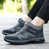 Women's black and grey waterproof insulated hiking boots with an anti-slip sole, designed for style and functionality in outdoor activities.