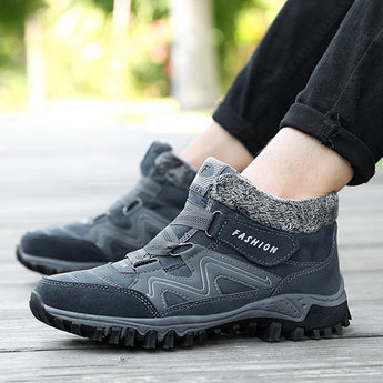 Women's black and grey waterproof insulated hiking boots with an anti-slip sole, designed for style and functionality in outdoor activities.