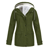 Women's green waterproof insulated parka in size 5XL, featuring a fur-lined hood and button closures. The parka is designed with a fashionable sleeve and collar, providing both style and warmth.