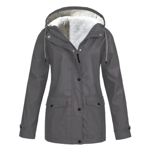 Women's gray waterproof insulated parka in size 5XL, featuring a fur-lined hood, long sleeves, and button details.