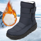 Women's blue waterproof insulated snow boots in size 44, featuring a non-slip sole and thermal lining, designed for durability in snowy conditions.