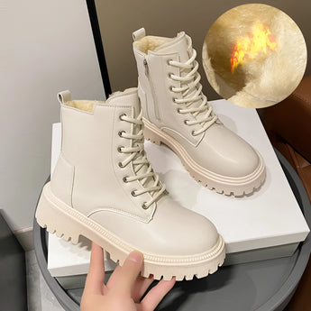 Women's white waterproof insulated snow boots designed for durability, non-slip grip, and thermal protection, suitable for outdoor activities.