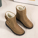 Women's waterproof insulated snow boots in beige featuring a durable design with non-slip synthetic rubber soles and thermal insulation for warmth.
