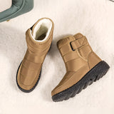 Brown women's waterproof insulated snow boots with a durable and non-slip design, featuring a fashion-forward look with beige accents, made from leather suitable for outdoor use.