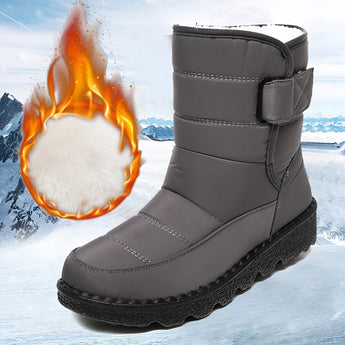Women's gray waterproof insulated snow boots in size 44, designed for non-slip traction and thermal warmth, featuring durable synthetic rubber material suitable for outdoor use.