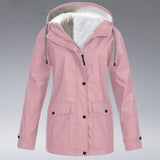 A pink women's insulated winter parka with a hood, featuring long sleeves and buttons, designed for cold weather. The jacket is available in a 3XL size and made from natural materials, offering both fashion and functionality.