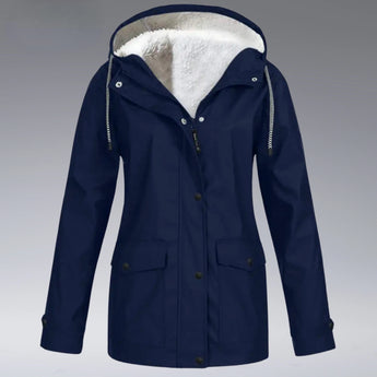 Women's dark blue insulated hooded winter parka with waterproof material, featuring a button-up front, long sleeves, and a cozy collar for added warmth.