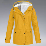 Women's yellow waterproof insulated hooded winter parka in size 3XL, featuring a stylish design with long sleeves, a protective collar, and a durable outerwear finish.