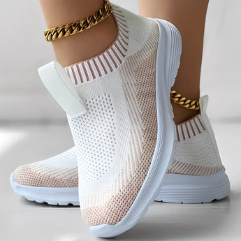 Women's white and black knit slip-on sneakers with rose accents, size 40.5, featuring a breathable and lightweight design suitable for sportswear and comfort.