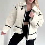 
A stylish and cozy women's white faux fur winter jacket featuring a high collar, long sleeves, and a tailored waist, perfect for street wear.
