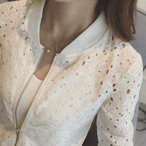 Women's white floral lace zip-up jacket featuring lightweight spring outerwear design with long sleeves, a collar, and intricate lace detailing across the shoulders, chest, and waist.