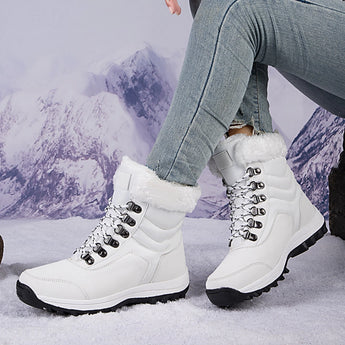 Women's white fur-lined insulated snow boots designed for winter wear, featuring a non-slip sole, displayed in size 42, with a stylish and fashionable appearance.