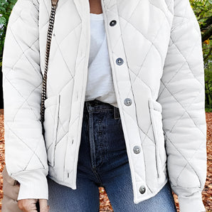 Women's white lightweight quilted insulated winter jacket with a collar and long sleeves, designed for cold weather fashion.