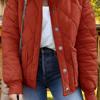 Red lightweight quilted insulated winter jacket for women featuring a stylish design with a standing collar and full sleeves, perfect for cold weather.