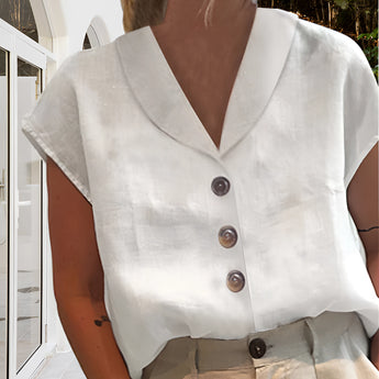 Women's white linen blouse with short sleeves, V-neck, and button-down front, perfect for summer.