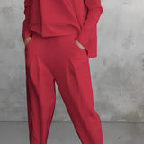 Women's red lounge set featuring a minimalist sweatshirt and relaxed joggers, displayed in size 3XL. The outfit includes long sleeves, a comfortable fit around the waist, and a relaxed style ideal for casual or sportswear use.