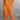 
A woman wearing an orange 3XL lounge set consisting of a minimalist sweatshirt and relaxed joggers. The top features long sleeves and a simple collar, while the bottom has a comfortable waist and fits loosely around the thighs.