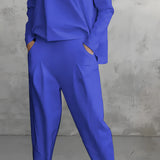 Women's blue lounge set featuring a minimalist sweatshirt with relaxed joggers, showcasing elements like shoulder, neck, sleeves, waist, and legs, suitable for comfort and casual wear in 3XL size.