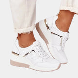 Women's white platform sneakers with zipper designed for walking, featuring a stylish and fashionable look.