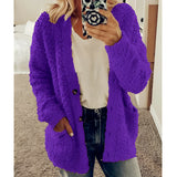 
A women's white teddy coat in a soft plush material, styled as a fluffy winter cardigan with a purple hue, featuring long sleeves, a collar, and a comfortable waist-length fit.