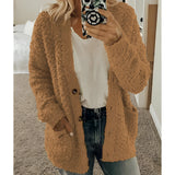 A woman wearing a soft plush women's white teddy coat, styled as a fluffy winter cardigan in coffee color, size 5XL. The coat features long sleeves, a collar, and is worn over a dress shirt, capturing a cozy and fashionable winter outerwear look.